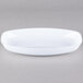 A white oval Fineline Platter Pleasers bowl.