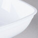 A close-up of a Fineline white plastic Luau bowl.