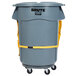 A grey trash can with yellow straps.