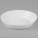 A 10 Strawberry Street white stoneware bowl on a gray background.
