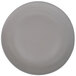 A close-up of a gray 10 Strawberry Street RPPLE stoneware dinner plate with a wave design.