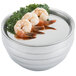 A Vollrath stainless steel round cover on a metal display tray with a bowl of shrimp and kale.