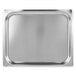 A stainless steel Vollrath Super Pan rectangular cover on a metal tray.