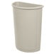 A beige Rubbermaid half round trash can with a lid.