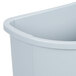 A close up of a gray Rubbermaid half round plastic trash can with a lid.