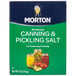 A box of Morton canning and pickling salt on a grocery store shelf.