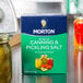 A box of Morton Canning and Pickling Salt on a grocery store shelf.