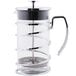 A Libbey stainless steel and glass French press with metal accents.