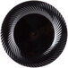 A black circular Visions Wave plastic plate with a swirl design.