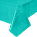 A teal lagoon plastic table cover on a table.