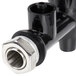 An Avantco black plastic water valve with a metal nut.