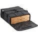 A black Choice insulated deli tray and party platter bag containing pizza boxes.