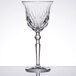A close-up of a Nachtmann crystal white wine glass with a stem.