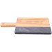 An American Metalcraft olive wood and black marble serving board with a wooden edge and a grey rectangular handle.