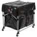A black plastic cover on a Rubbermaid laundry cart with a black plastic bag inside.