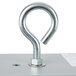 A close-up of a silver metal hook on a Cardinal Detecto digital hanging scale.