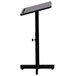 A black metal lectern with an adjustable stand.