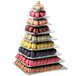 A pyramid of different colored macaroons displayed on a Matfer Bourgeat clear macaron display stand.