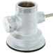 A T&S silver metal twist waste valve with a round cap.