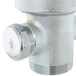 A T&S stainless steel twist waste valve with a round cap and strainer basket.