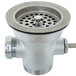 A silver metal T&S twist waste valve with a round hole and removable strainer basket.