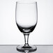 A close-up of a clear Reserve by Libbey wine glass on a white background.