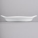 A white rectangular Libbey porcelain dish with a handle.