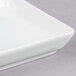 A Libbey Aluma White porcelain tray with a small square cut out in the corner.