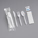 A Choice white medium weight wrapped plastic fork.