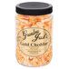 A jar of Grandma Jack's Gourmet Gold Cheddar Popcorn with a black lid.