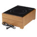 A Cal-Mil bamboo countertop induction cooker on a wooden table.