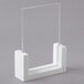 A white rectangular Cal-Mil U-frame tabletop card holder with clear plastic frame inserts.
