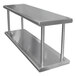 A stainless steel Advance Tabco pass-through shelf with two shelves on it.