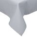 A gray square tablecloth with a hemmed edge on a table.