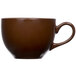 A close-up of a brown Tuxton mahogany cappuccino cup with a handle.