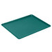 A teal plastic Cambro dietary tray with a handle.