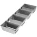 A Chicago Metallic aluminized steel bread loaf pan with four compartments.