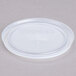 A white translucent plastic Cambro lid with a straw slot.