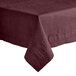A close-up of a burgundy Hoffmaster tablecloth on a table.