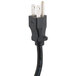 A close-up of a black power cord with a white plug.