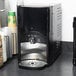 A Bunn liquid coffee dispenser on a counter.