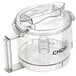A clear plastic food processor chopping bowl and cover with the word "chop" on it.