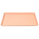 A pink rectangular tray with a white background.