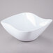 A white GET San Michele flare bowl on a gray surface.