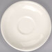 A Homer Laughlin ivory (American white) saucer with a narrow rim on a gray surface.