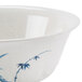 A close up of a Thunder Group Blue Bamboo melamine bowl with a blue and white bamboo design.
