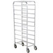 A Winholt stainless steel platter rack with wheels.