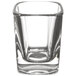 A close-up of a clear Libbey square shot glass.