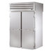A white True Spec Series roll-through refrigerator with two solid doors.