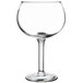 A close-up of a Libbey Bolla Grande wine glass with a stem.
